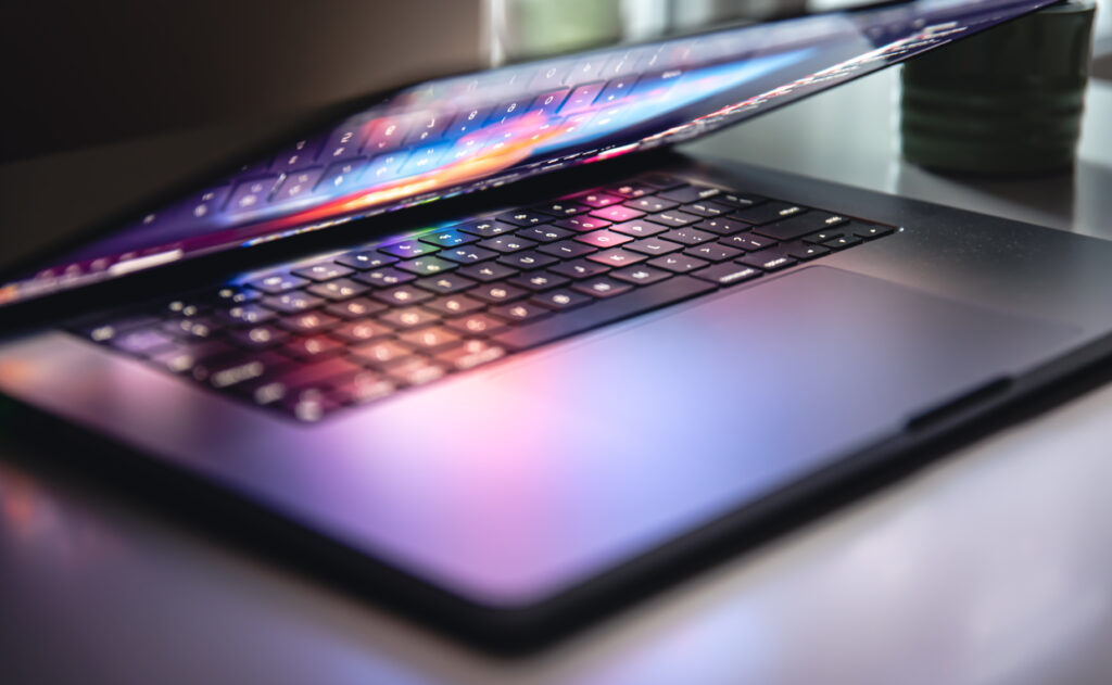 close up of laptop keyboard colorful neon illumina 2023 11 27 05 34 24 utc