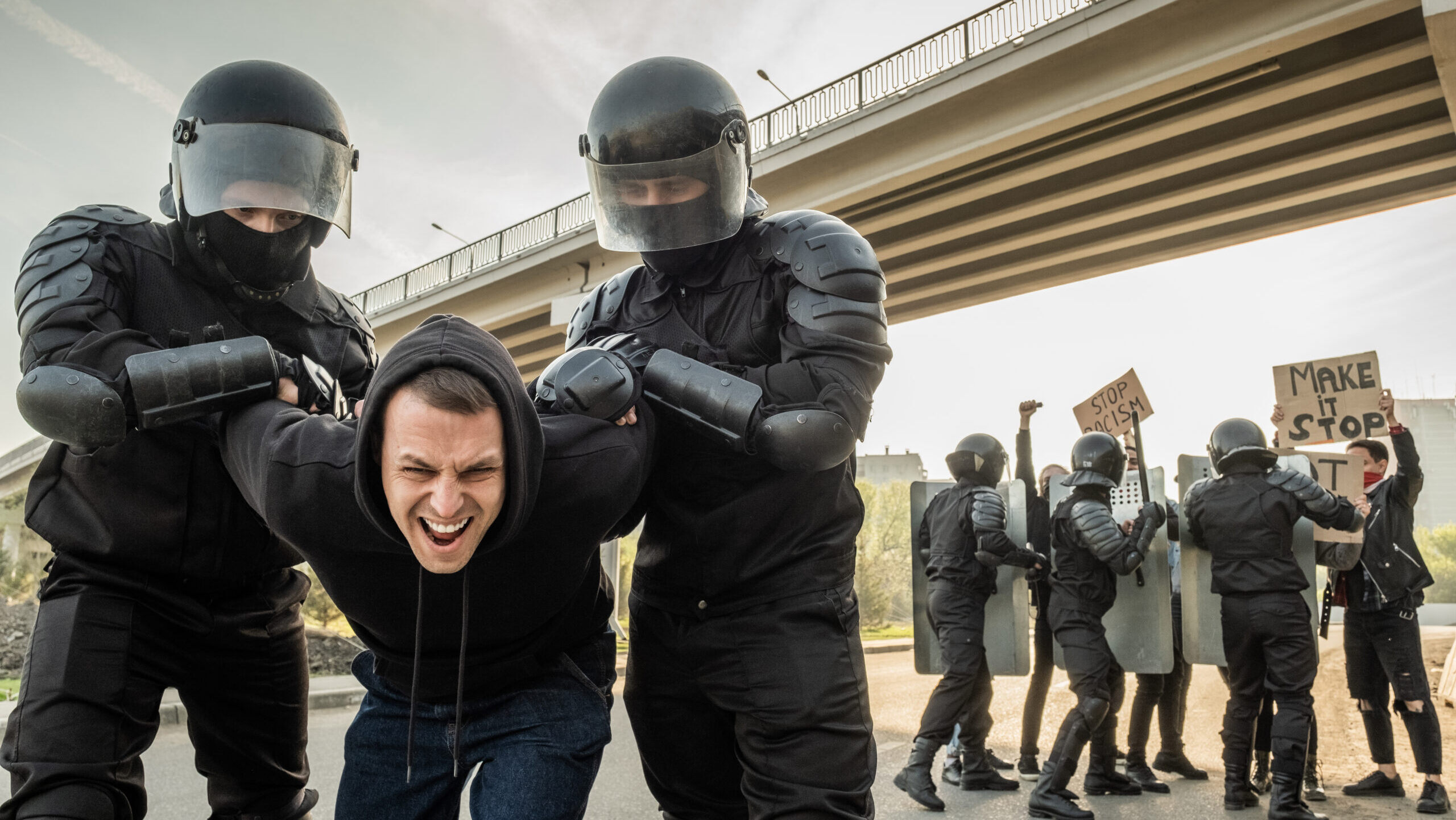 riot officer stopping protester 2023 11 27 05 11 25 utc scaled e1730444155452
