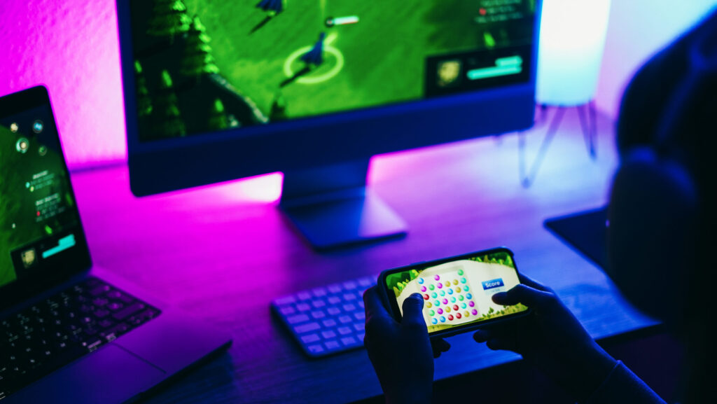 girl gamer playing video game online on mobile pho 2023 11 27 05 10 42 utc scaled e1730873404359